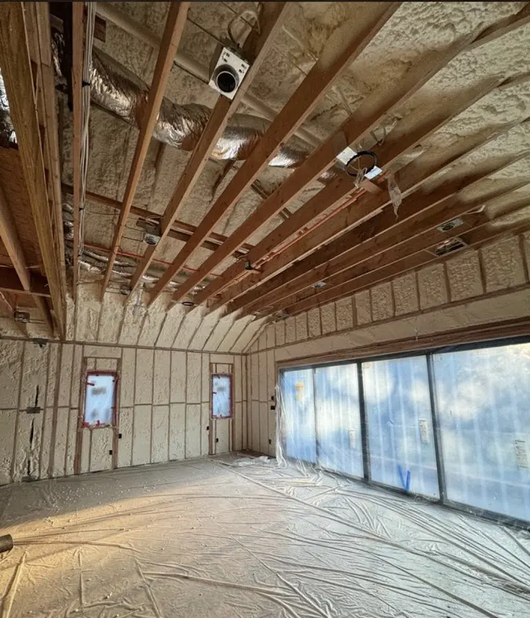 Interior walls and ceiling insulated with spray foam during new construction in Bellefontaine Neighbors